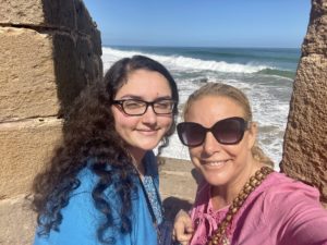 girls in front of ocean