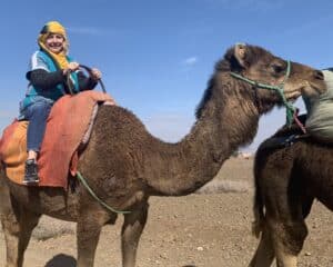 Me riding a camel in Morocco